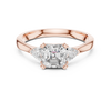 Enchanting Trio: Radiant-Cut Diamond Flanked by Pear Accents
