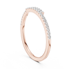 Gold band with a curved row of channel-set sparkling diamonds.