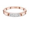 Band ring with a minimalist trio of small diamonds set on top.