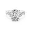 oval-cut diamond center and marquise-cut side stones.