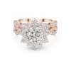Round center diamond and intricate halo and band of smaller diamonds.