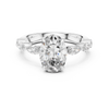 Oval-Cut Diamond Engagement Ring with Marquise-Cut Diamond Band.