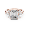 Emerald-cut solitaire ring with marquise diamonds