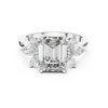 Emerald-cut solitaire ring with marquise diamonds