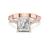 Twisted band engagement ring with a sparkling square-cut diamond centerpiece.
