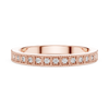 band with milgrain edges and sparkling round diamonds.