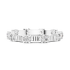 eternity band with round diamonds set in a unique prong design.