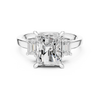 Radiant-Cut Diamond Ring with Emerald-Cut Side Stones in a Classic Three-Stone Setting