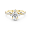 Round center diamond ring with six-prong setting and pav‚ band