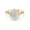 round center diamond ring with floral-inspired halo of round and baguette diamonds