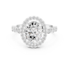 Oval cut diamond halo ring with a diamond-accented band.