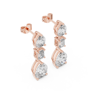 Trio Radiance: Drop Earrings with Pear, Emerald, and Round Diamonds