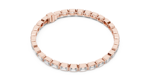 Elegant Gold Tennis Bracelet with Emerald-Cut Diamonds