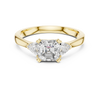 Enchanting Trio: Radiant-Cut Diamond Flanked by Pear Accents