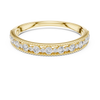 Band with delicate milgrain edges and graduated round-cut diamonds.