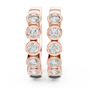 Rose gold hoop earrings with bezel-set round diamonds