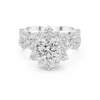 Round center diamond and intricate halo and band of smaller diamonds.