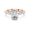 Oval-Cut Diamond Engagement Ring with Marquise-Cut Diamond Band.