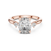 Round-Cut Diamond and Hidden Accent Stones in a Cathedral Setting.