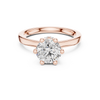 solitaire engagement ring with diamond halo beneath center stone