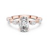Diamond engagement ring with marquise side stones and a round center stone