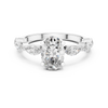 Diamond engagement ring with marquise side stones and a round center stone