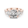 Diamond three-stone engagement ring with trapezoid side stones and pav‚ band