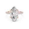 a large oval diamond and a wide pav‚ diamond band.