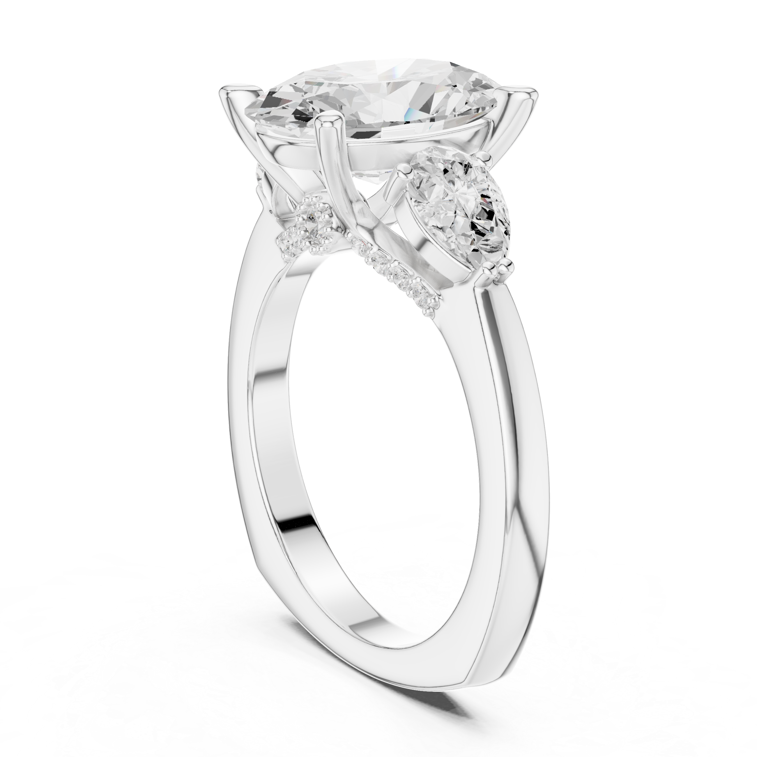 Oval Center Diamond with Two Pear Side Stones Ring