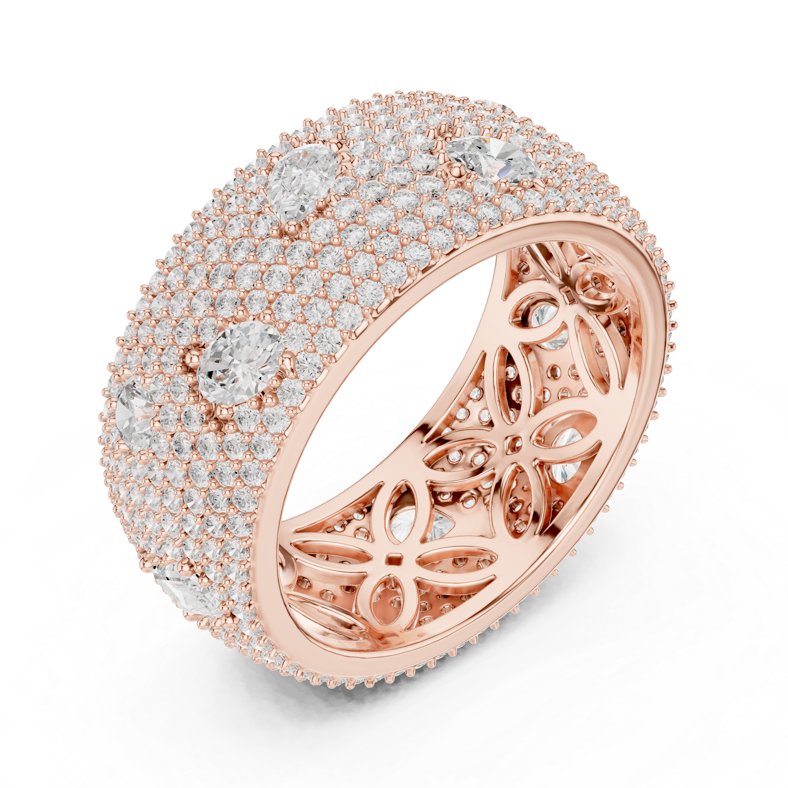 Round diamonds with scattered pear-shaped diamonds and an ornate filigree inner design.