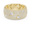 Round diamonds with scattered pear-shaped diamonds and an ornate filigree inner design.
