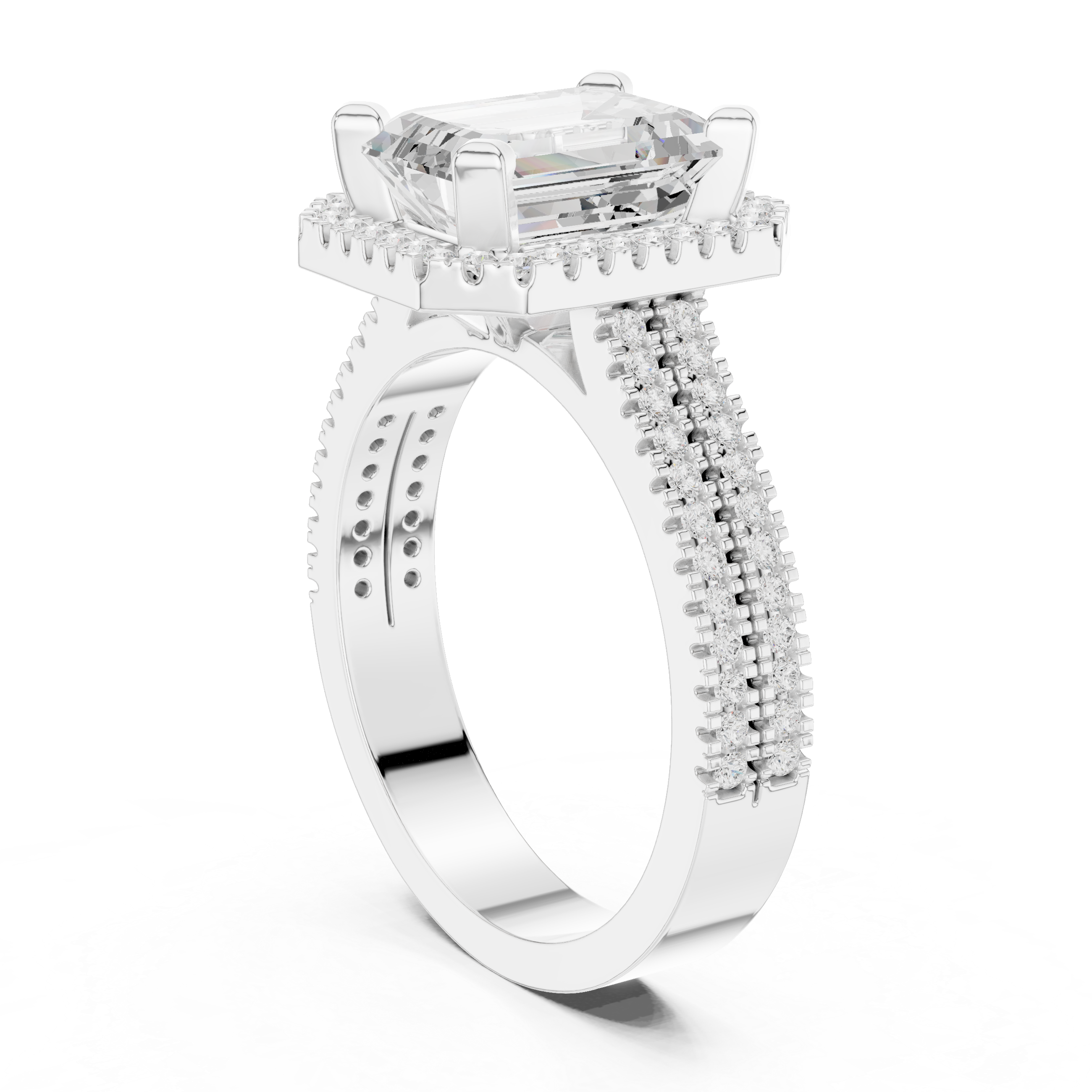 Emerald cut diamond halo ring with a triple pav‚ diamond band.