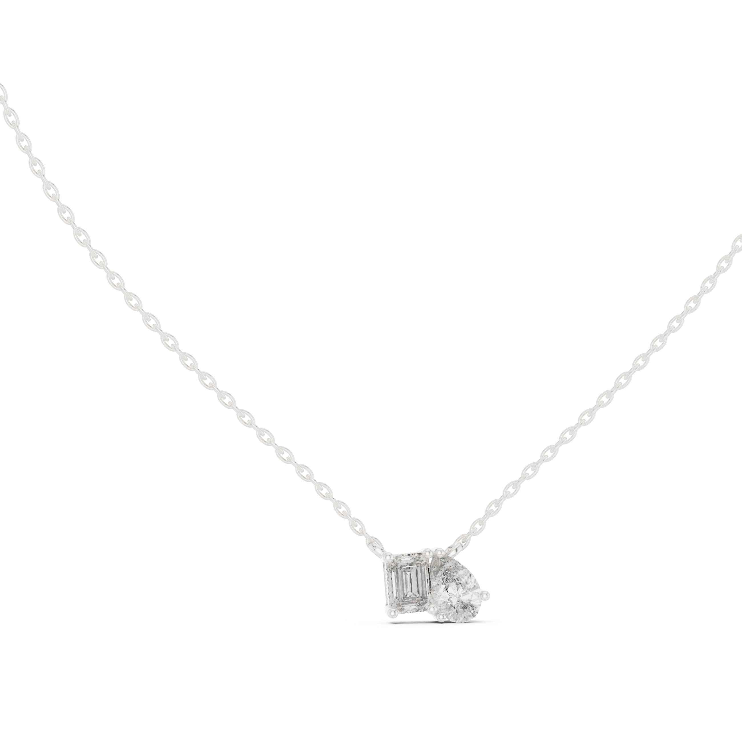 Emerald and pear-cut diamond duo pendant