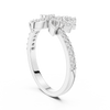 Filigree band ring with intricate cutwork and diamond accents.