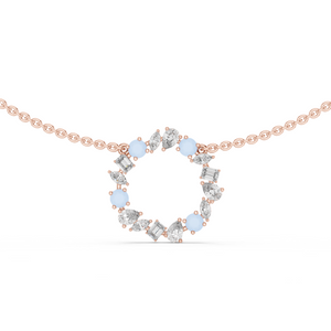 Rose Gold Circle Necklace with Mixed-Cut Crystals and Soft Blue Accents.