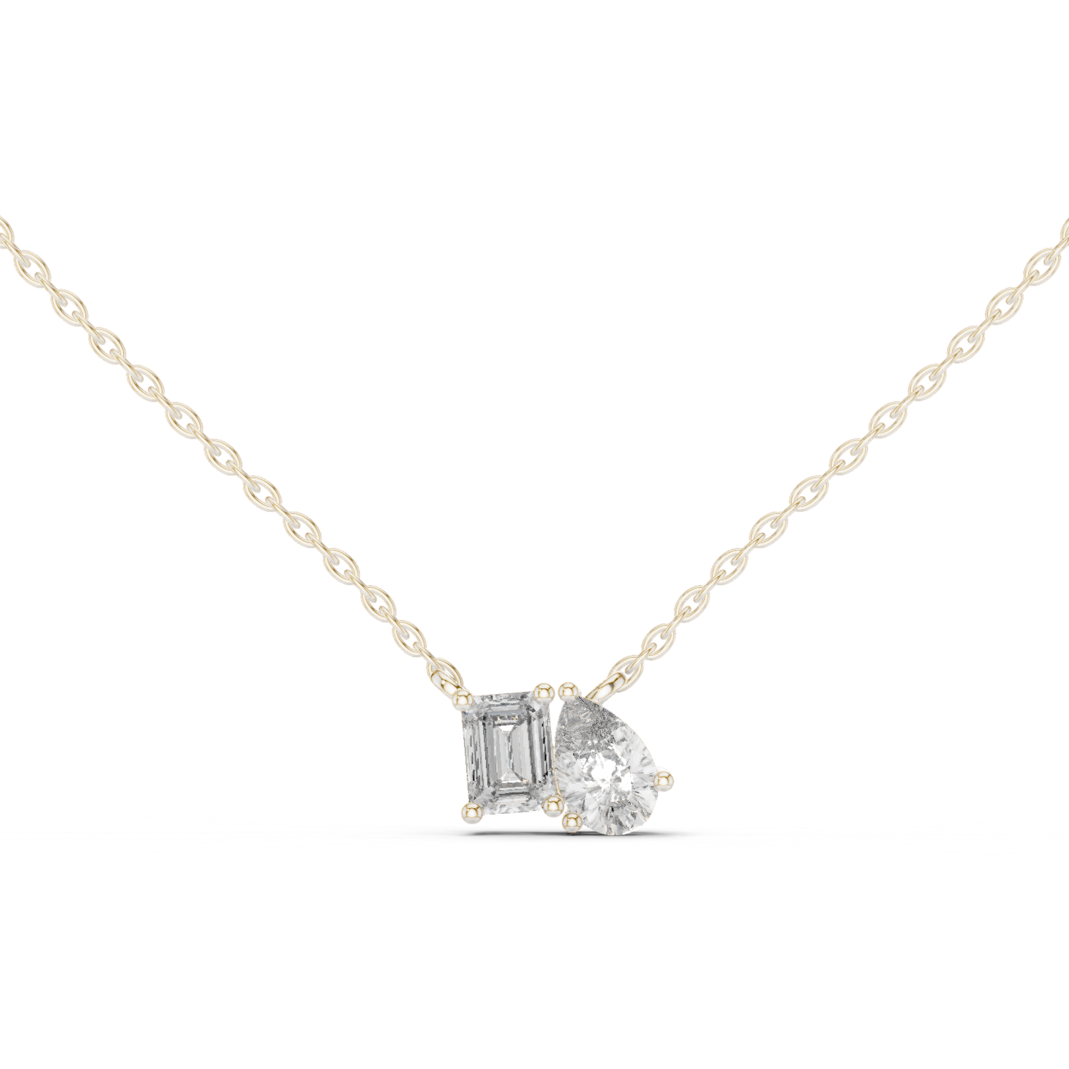 Emerald and pear-cut diamond duo pendant
