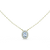 oval-cut diamond surrounded by a halo of smaller diamonds.